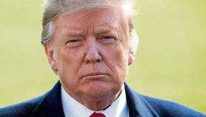 Gardai engaging with protest groups at Shannon Airport during Donald Trump visit