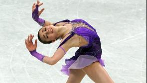 Kamila Valieva leads standings as 15-year-old competes amid cloud of controversy