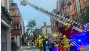 Nine people rescued from apartment building after e-bike goes on fire 