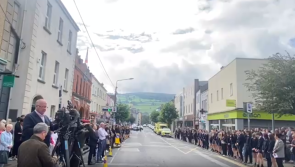 WATCH: Mourners line the streets of Clonmel ahead of McSweeney siblings' funeral