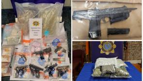 Garda&iacute; seize ten guns, over &euro;5m worth of drugs and cash in series of Dublin raids 