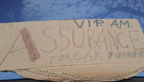 Banned driver using cardboard cut-out as insurance disc caught turning at Garda checkpoint