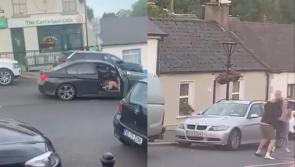Two arrests after road rage incident injures three and leaves cars and building 'smashed up'