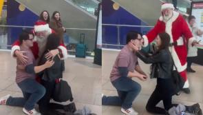 WATCH: Magical moment Santa Claus walks by marriage proposal in Dublin Airport 