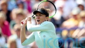 Simona Halep suffers panic attack during second-round defeat at French Open