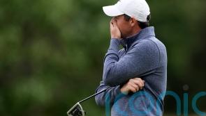 Rory McIlroy battles to remain in contention after breezy conditions at US Open