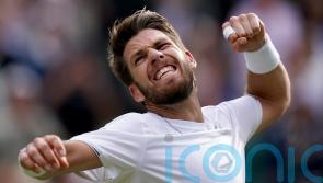 British number one Cameron Norrie battles back to beat Jaume Munar in five sets