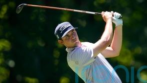 JT Poston takes two-shot lead at John Deere Classic