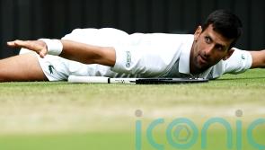 Novak Djokovic battles back to keep nine-year Centre Court run going