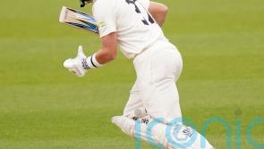 Ollie Pope&rsquo;s half-century helps leaders Surrey edge ahead of Warwickshire