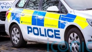 Pensioner killed after being struck by car that rolled down hill