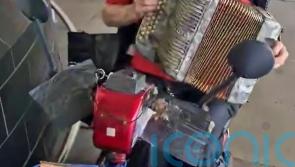 &lsquo;Sweet, lovely&rsquo; 87-year-old man shown busking for Ukraine months before attack