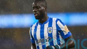 Debut Naby Sarr goal sends Reading top after battling win at Millwall