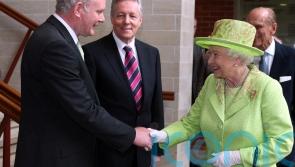 Martin McGuinness and Queen Elizabeth II handshake was 'quite long', says photographer