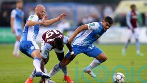 Josh Gordon double sinks Newport to send Barrow into second spot