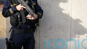 CCTV of two men in wig and flat cap shown at Regency murder trial