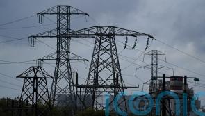 Windfall tax on electricity companies will help protect consumers, minister says