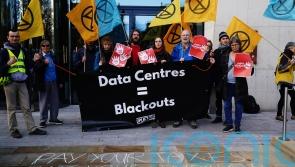 Crowd gathers at Amazon&rsquo;s European HQ as part of worldwide Black Friday protest