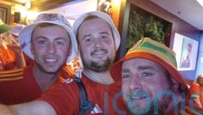 Fan flies last minute to watch Wales in World Cup &ndash; without telling girlfriend