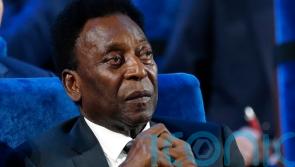 Brazil hero Pele improving in hospital after treatment for respiratory infection