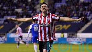 Sheffield United beat Wigan to cement second-place spot in the Championship