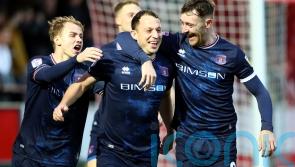 Kristian Dennis bags a brace as Carlisle close in on top three