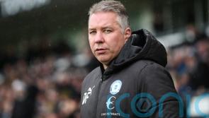 Darren Ferguson relieved after Peterborough survive Portsmouth rally