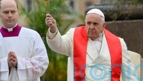 Pope Francis battled hoarse voice during Palm Sunday mass after bout of bronchitis