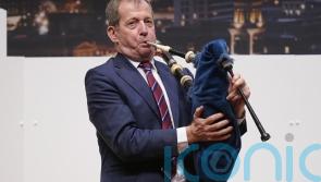Alastair Campbell plays bagpipes lament for late Good Friday Agreement figures