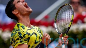 Carlos Alcaraz digs in to avoid shock defeat by Emil Ruusuvuori in Madrid