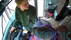 &lsquo;Little hero&rsquo; steers school bus to safety after driver passes out