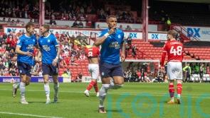 Peterborough book play-off place with victory at Barnsley