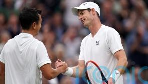 Wimbledon day two: Andy Murray puts on a show as rain decimates schedule