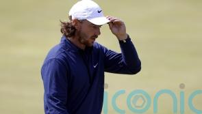 Tommy Fleetwood driven on by home support as he takes share of Open lead
