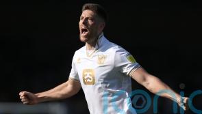 Barrow fight back to beat 10-man Sutton with late goals