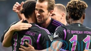 Harry Kane scores on Bundesliga debut as champions Bayern open with big away win