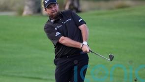 Irish golfer Shane Lowry three shots off pace as severe wet weather suspends play in US