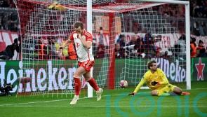 Harry Kane fires Bayern Munich into quarter-finals of Champions League