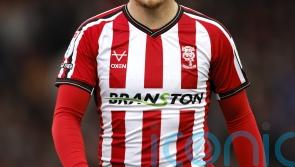 Lincoln batter Cambridge to maintain long unbeaten run and play-off push