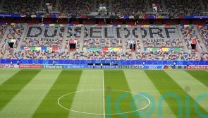 Police make two arrests after &lsquo;small pocket of disorder&rsquo; from fans in Dusseldorf