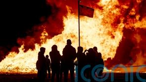 Police investigate NI election posters and flags on bonfires as hate incidents