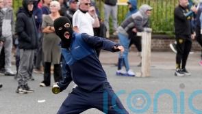 Harris condemns violent scenes as gardai attacked at anti-immigration protest