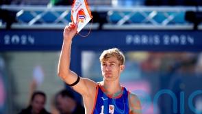 Crowd boos convicted child rapist Steven van de Velde at beach volleyball