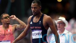 Zharnel Hughes withdraws from 200m heats with &lsquo;hamstring tightness&rsquo;