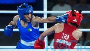 Algerian fans celebrate as Imane Khelif books place in women&rsquo;s 66kg final
