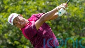 Hideki Matsuyama finds passport to share of halfway lead