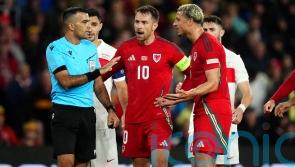 Wales begin Craig Bellamy era with point as 10-man Turkey hold out