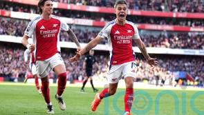 Arsenal strike twice in stoppage time to see off stubborn Leicester