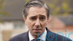 Taoiseach accuses Sinn Fein of &lsquo;hypocrisy&rsquo; over opposition to phone pouch scheme