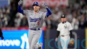 Los Angeles Dodgers hang on late to clinch third win of World Series